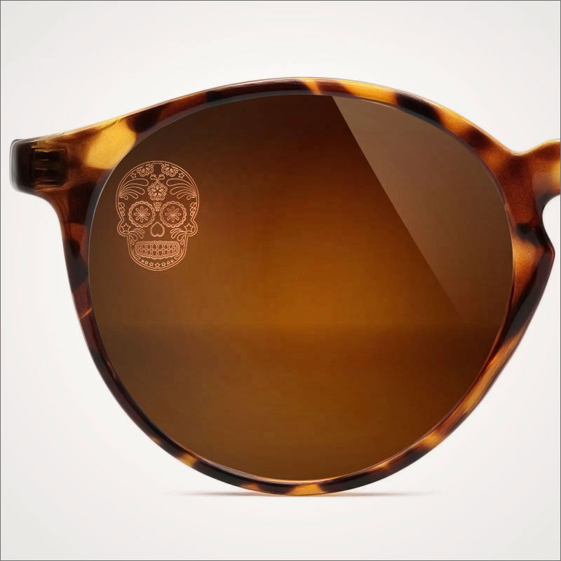 Frame with SpecTats Sugar Skull design in Copper Blush on a Brown Polarized Lens