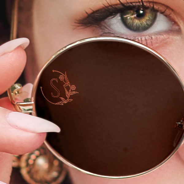 Close up of a woman wearing sun glasses with a Vintage Letter SpecTats design